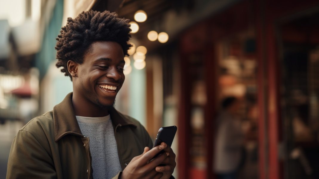 a man on a phone all jolly after knowing how to boost betting potential